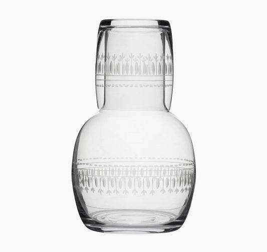 A Crystal Carafe Set with Ovals Design